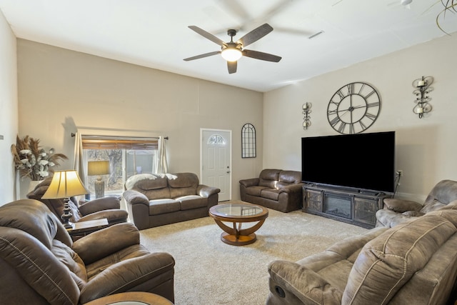 living room featuring ceiling fan and carpet flooring