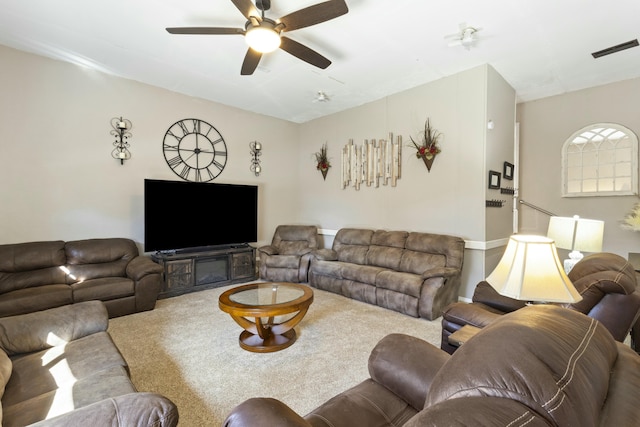 living room featuring ceiling fan, carpet floors, and visible vents