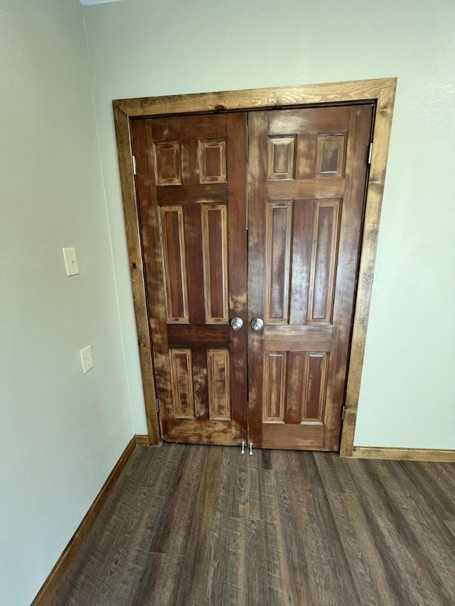 interior space with dark hardwood / wood-style floors