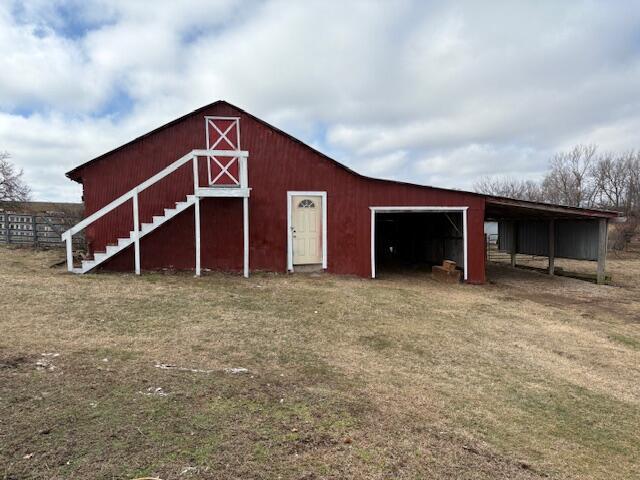 view of outdoor structure with a yard