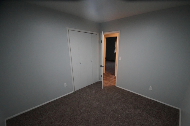 empty room featuring carpet floors