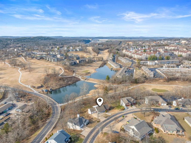 birds eye view of property featuring a residential view and a water view