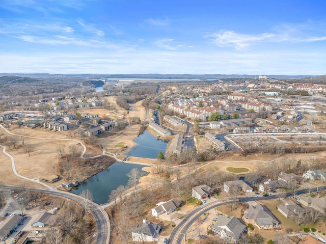 birds eye view of property featuring a water view and a residential view