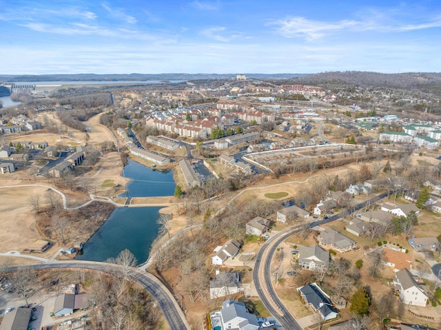 bird's eye view with a water view and a residential view