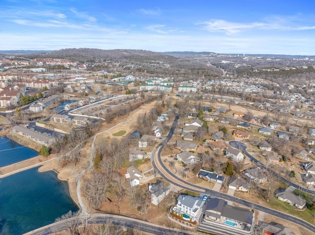 birds eye view of property featuring a residential view and a water view