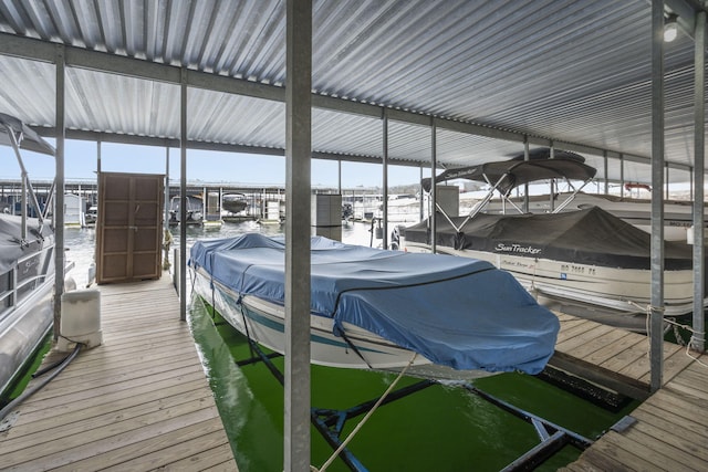 dock area featuring a water view