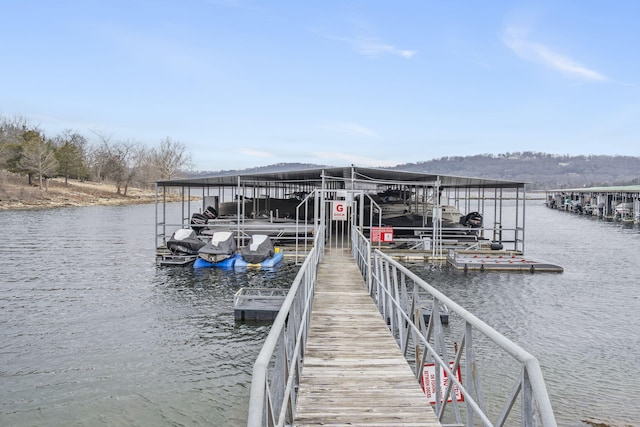 view of dock featuring a water view