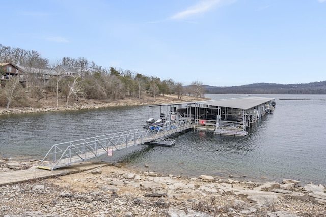 view of dock with a water view