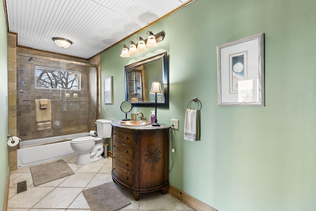 full bathroom with vanity, tile patterned floors, shower / bath combination with glass door, and toilet