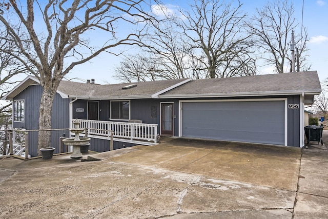 ranch-style house featuring a garage