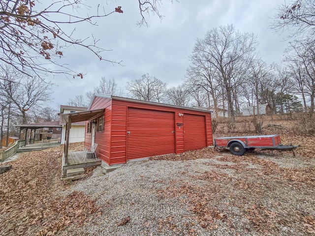 view of outdoor structure with a garage