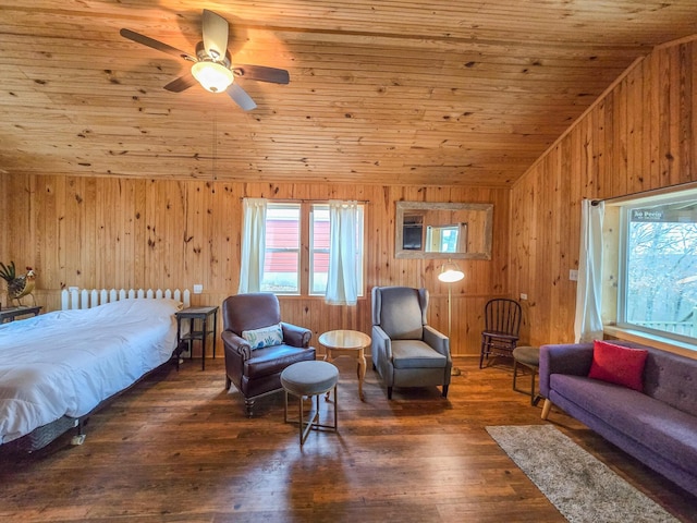 bedroom featuring wood walls, lofted ceiling, dark hardwood / wood-style flooring, and wooden ceiling