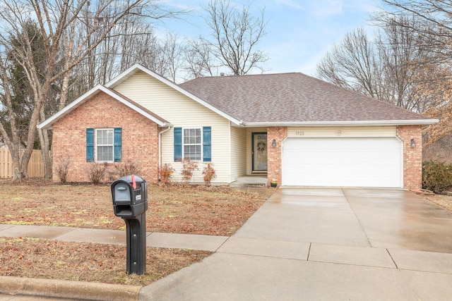 single story home featuring a garage