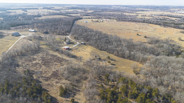 birds eye view of property featuring a rural view