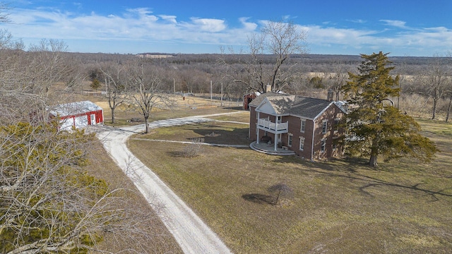 birds eye view of property featuring a rural view