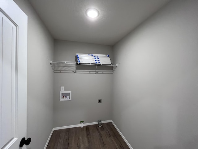 clothes washing area with gas dryer hookup, dark hardwood / wood-style floors, hookup for a washing machine, and electric dryer hookup