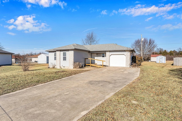 ranch-style house featuring a garage, a front yard, and a storage shed