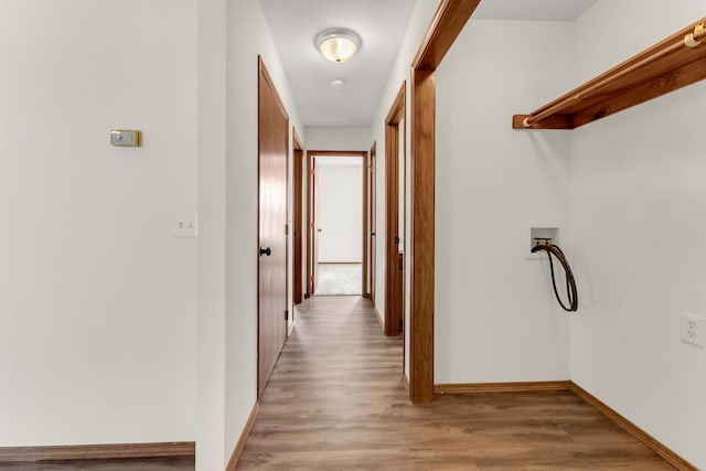 corridor featuring light wood-type flooring