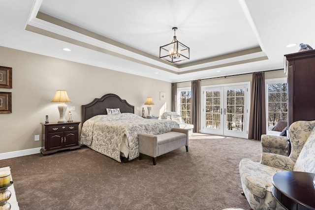 carpeted bedroom featuring french doors, an inviting chandelier, crown molding, a tray ceiling, and access to exterior