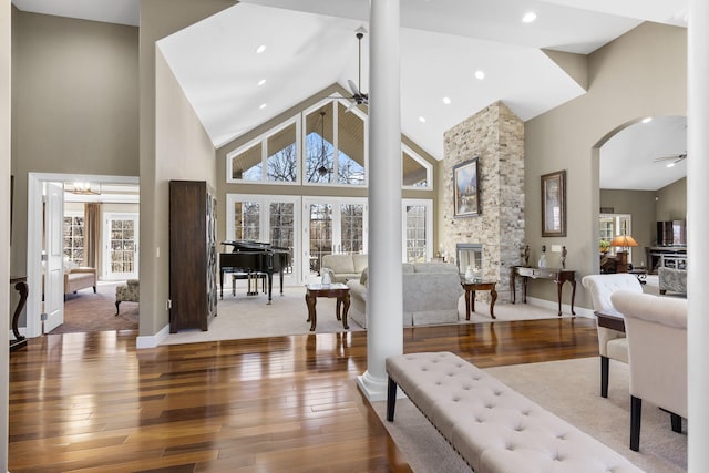 foyer with plenty of natural light, wood-type flooring, and a ceiling fan