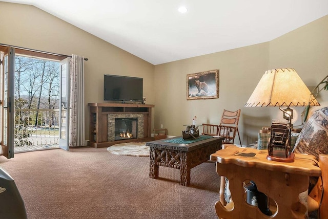 carpeted living room featuring lofted ceiling