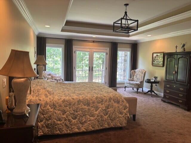 119 Silver Oak Way, Branson West, MO 65737 - carpeted bedroom featuring access to exterior, a tray ceiling, french doors, ornamental molding, and multiple windows