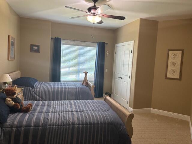 119 Silver Oak Way, Branson West, MO 65737 - carpeted bedroom with baseboards and ceiling fan