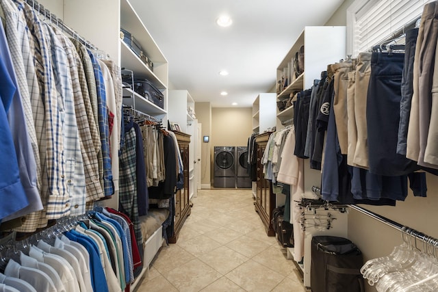 119 Silver Oak Way, Branson West, MO 65737 - walk in closet with washing machine and dryer and light tile patterned floors