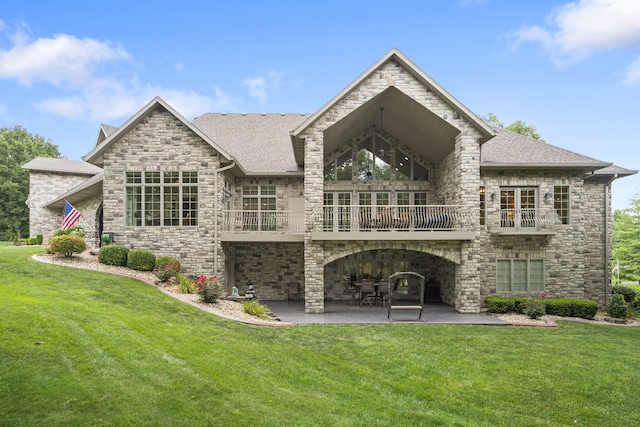 119 Silver Oak Way, Branson West, MO 65737 - rear view of house with a balcony, a patio area, a yard, and a shingled roof