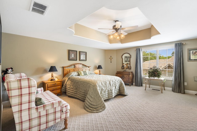 119 Silver Oak Way, Branson West, MO 65737 - carpeted bedroom with a tray ceiling and a ceiling fan