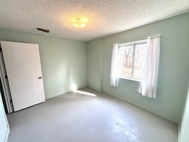 160 Old Glory Rd, Branson, MO 65616 - spare room with a textured ceiling