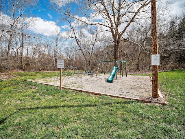 view of play area featuring a yard