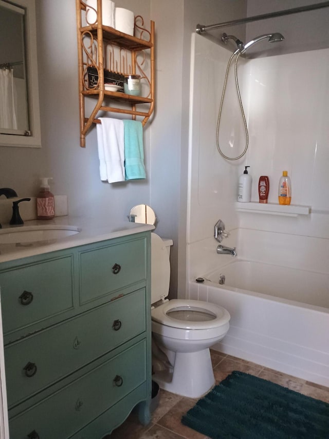 full bathroom with tile patterned flooring, vanity, shower / bathtub combination, and toilet