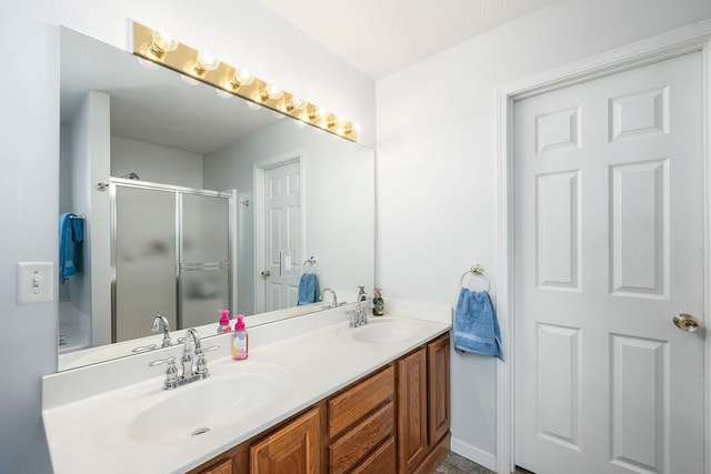 bathroom featuring vanity and walk in shower