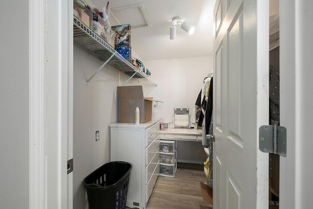 washroom featuring light hardwood / wood-style flooring and washer and dryer