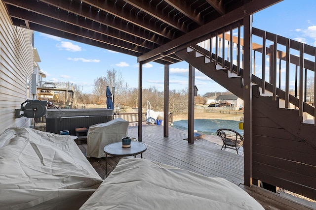 exterior space featuring a hot tub