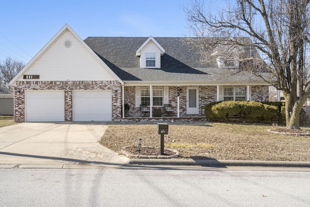 new england style home with a garage