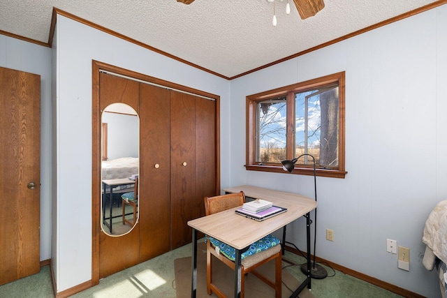 home office featuring light carpet, crown molding, and a textured ceiling