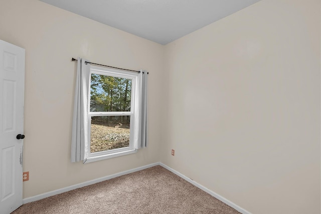 view of carpeted spare room