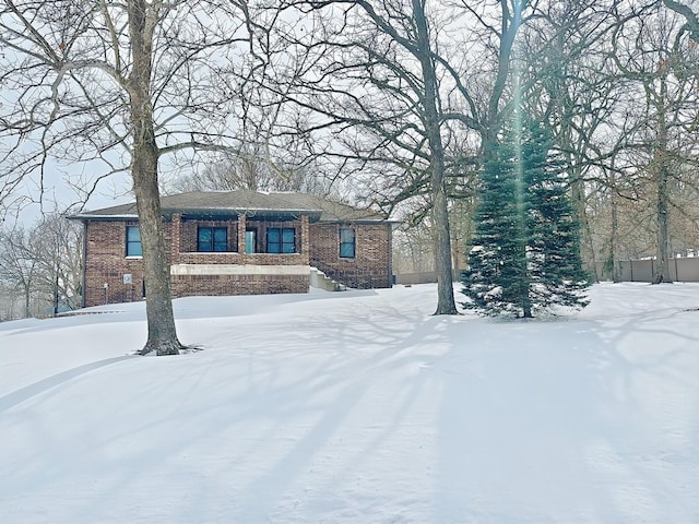 view of snowy property