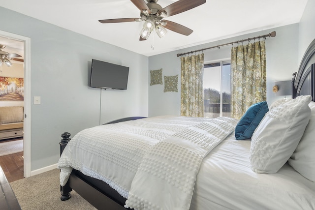 bedroom with ceiling fan and carpet