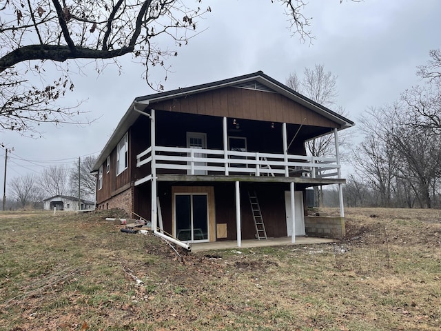 rear view of property with a patio area