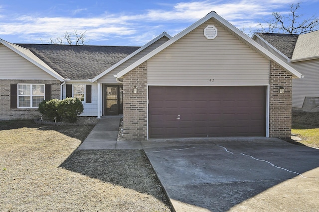 single story home with a garage