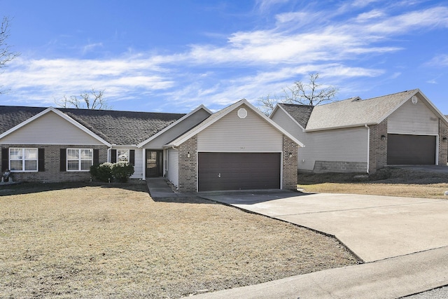 ranch-style house featuring a garage