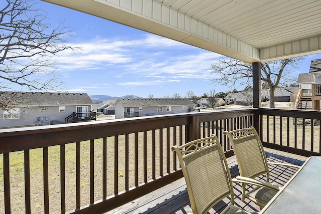 deck featuring a lawn