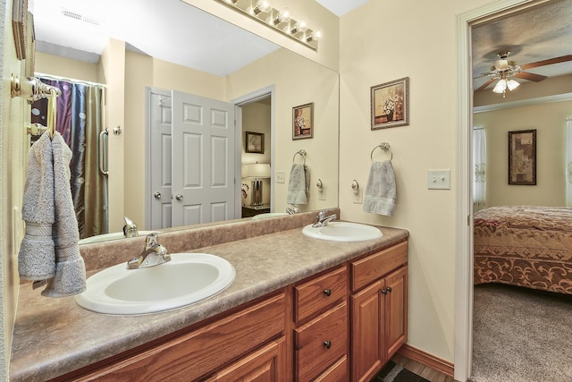 bathroom with vanity and ceiling fan