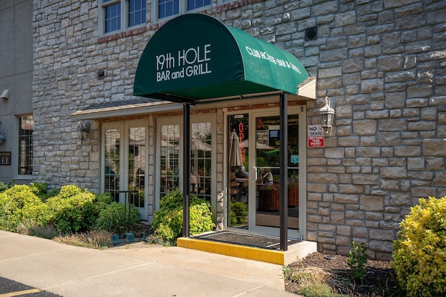 property entrance with french doors