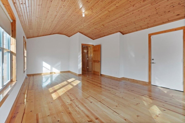 unfurnished room featuring lofted ceiling, wooden ceiling, and light hardwood / wood-style floors