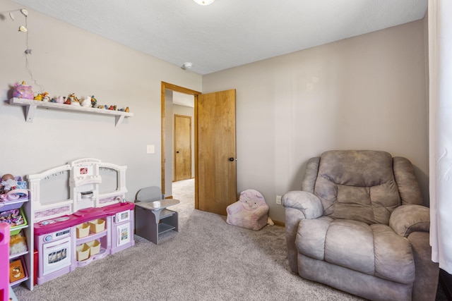 recreation room with carpet floors