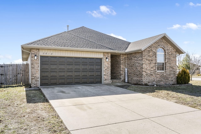 ranch-style home with a garage